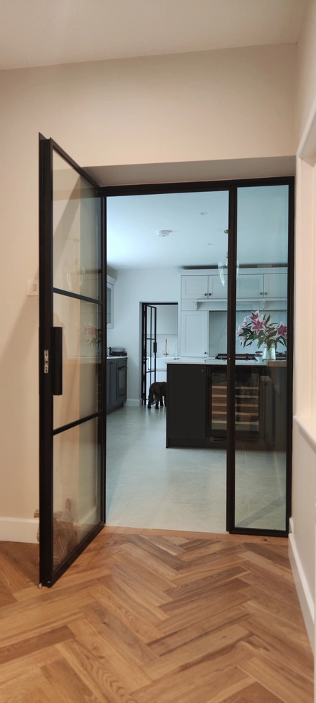 kitchen with metal windows and doors